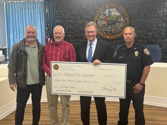 Treasurer Pack Returns More Than $23,000 in Unclaimed Property from Firearms Auction to Bluefield Police Department