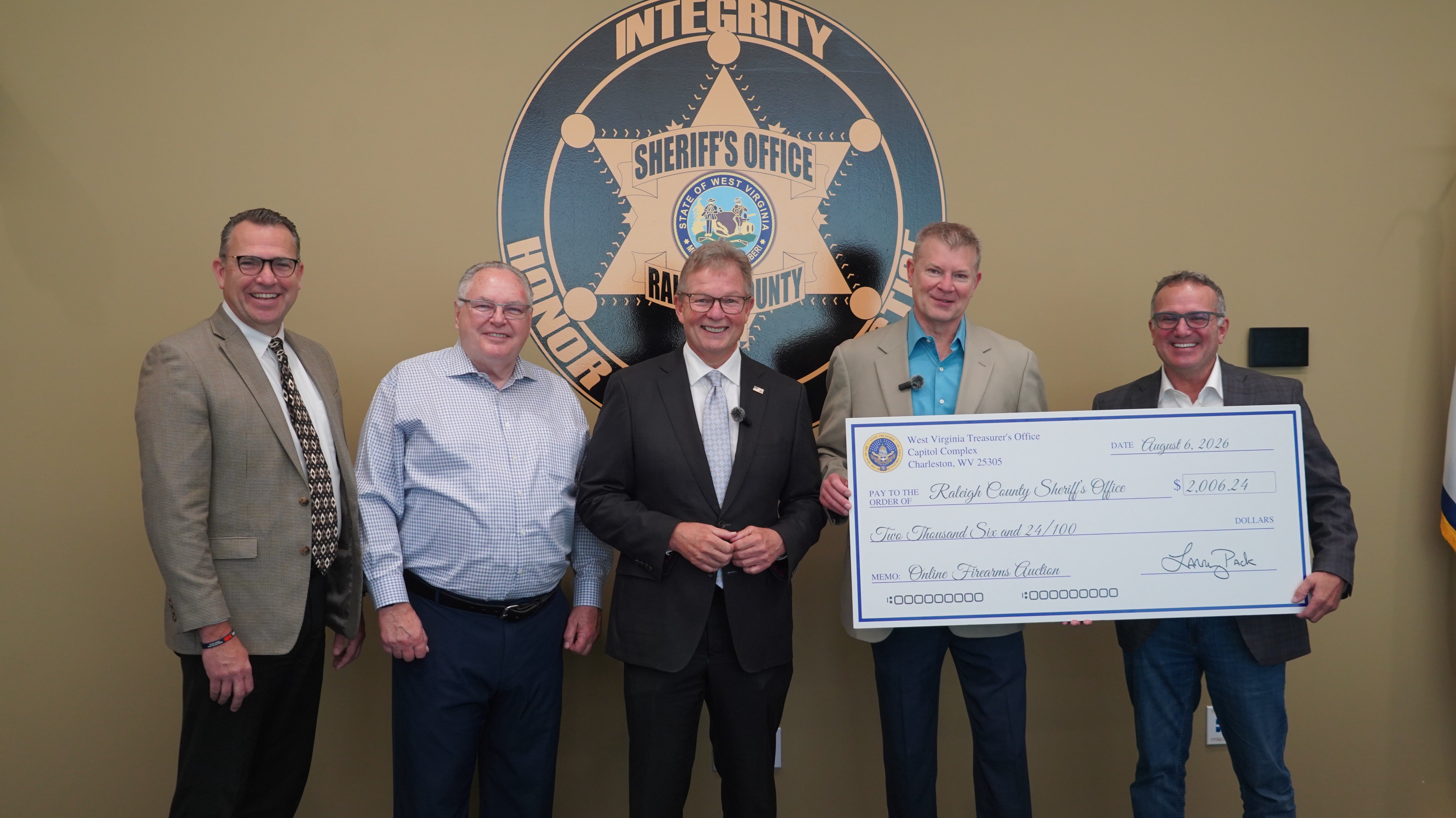 Treasurer Pack Returns More Than $2,000 to Raleigh County Sheriff’s Office from June Online Firearms Auction