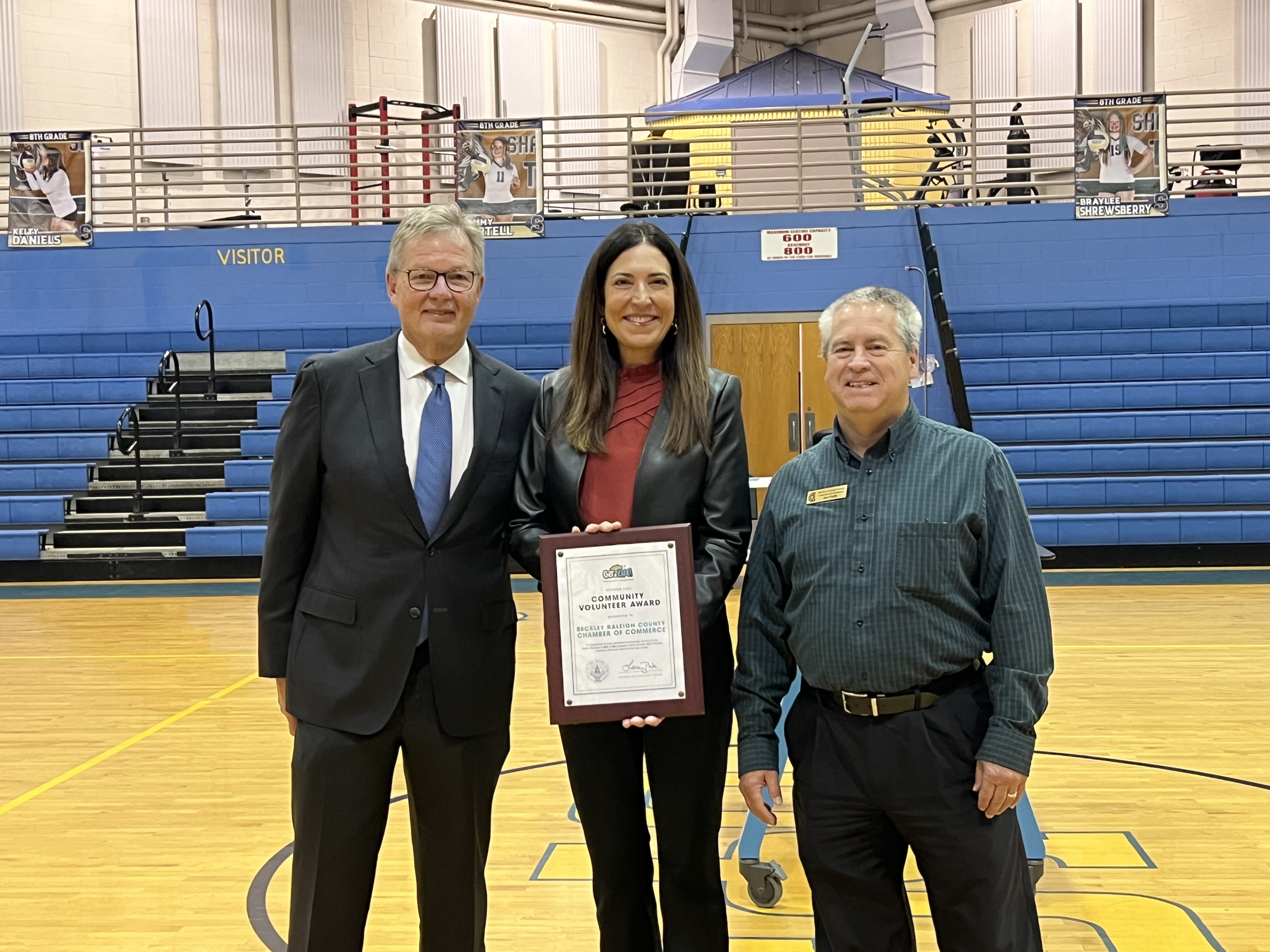 Treasurer Presents “Get a Life” Community Volunteer Award During Financial Education Event in Raleigh County