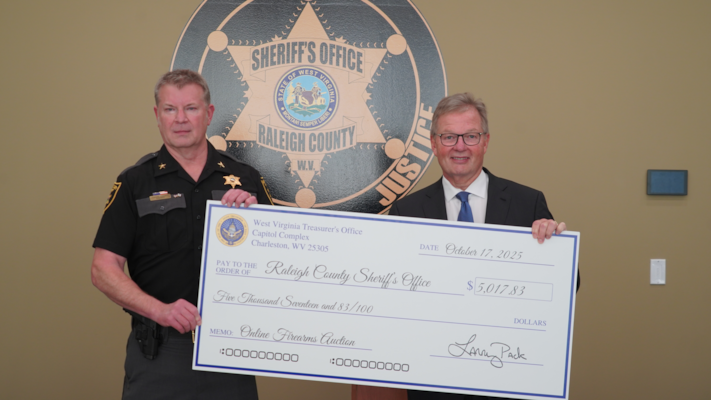Treasurer Pack Presents More Than $5,000 to Raleigh County Sheriff’s Office from September Online Firearms Auction