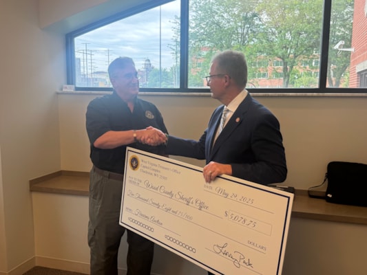 Treasurer Pack Returns More Than $5,000 in Unclaimed Property from Firearms Auction to Wood County Sheriff’s Office, Tours Evidence Rooms