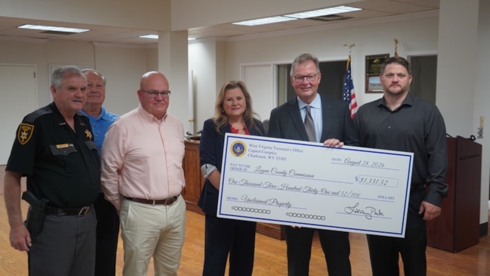 Treasurer Pack Returns More Than $1,300 in Unclaimed Property Funds to Logan County Commission