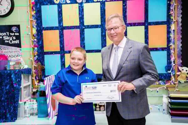 Treasurer Pack Announces 15 Regional Winners of SMART529 “When I Grow Up” Essay Contest, Presents $500 Check in Charleston